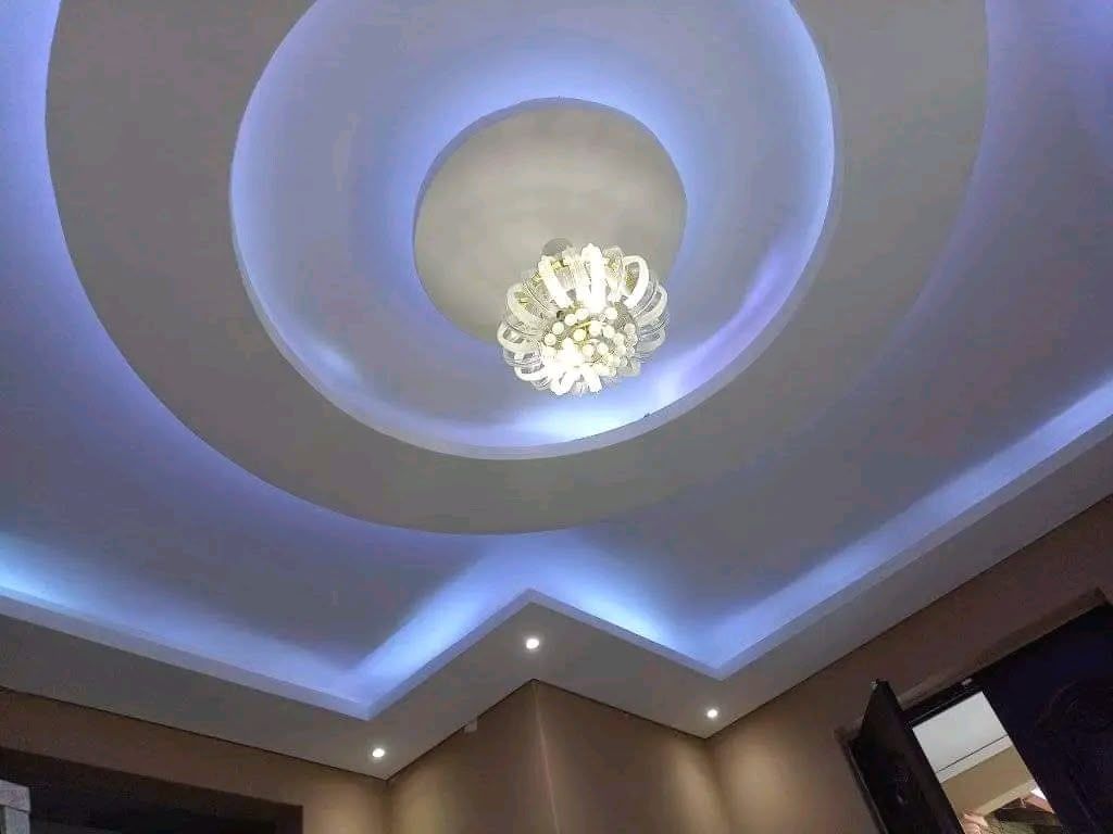 Layered ceiling with downlights